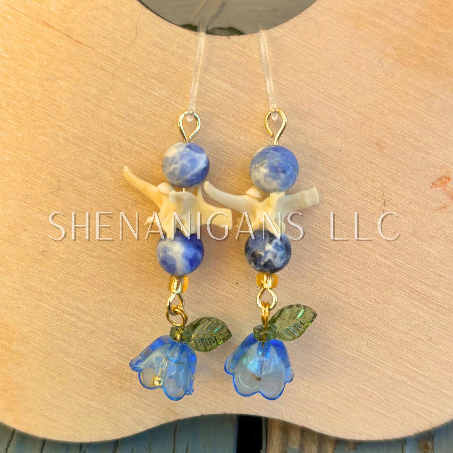 Blue and Gold Bell Flower Dangle Earrings with Snake Vertebrae and Crystal Beads