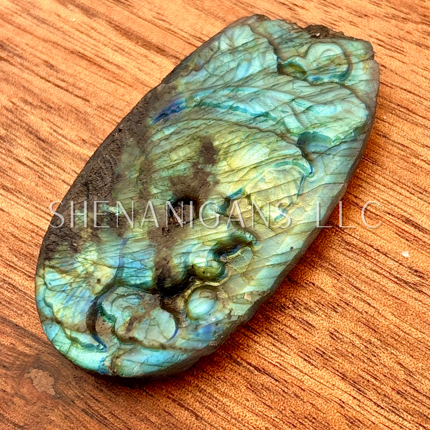 Flat carving labradorite phoenix