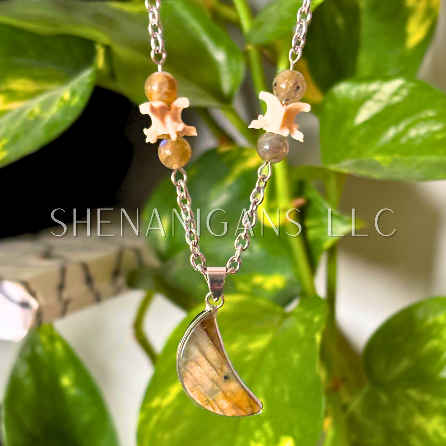 Orange Labradorite Crescent Moon Necklace with Snake Vertebrae