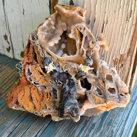 Spiderweb Jasper Hanging Fruit Bat Necklace with Rattlesnake Vertebrae