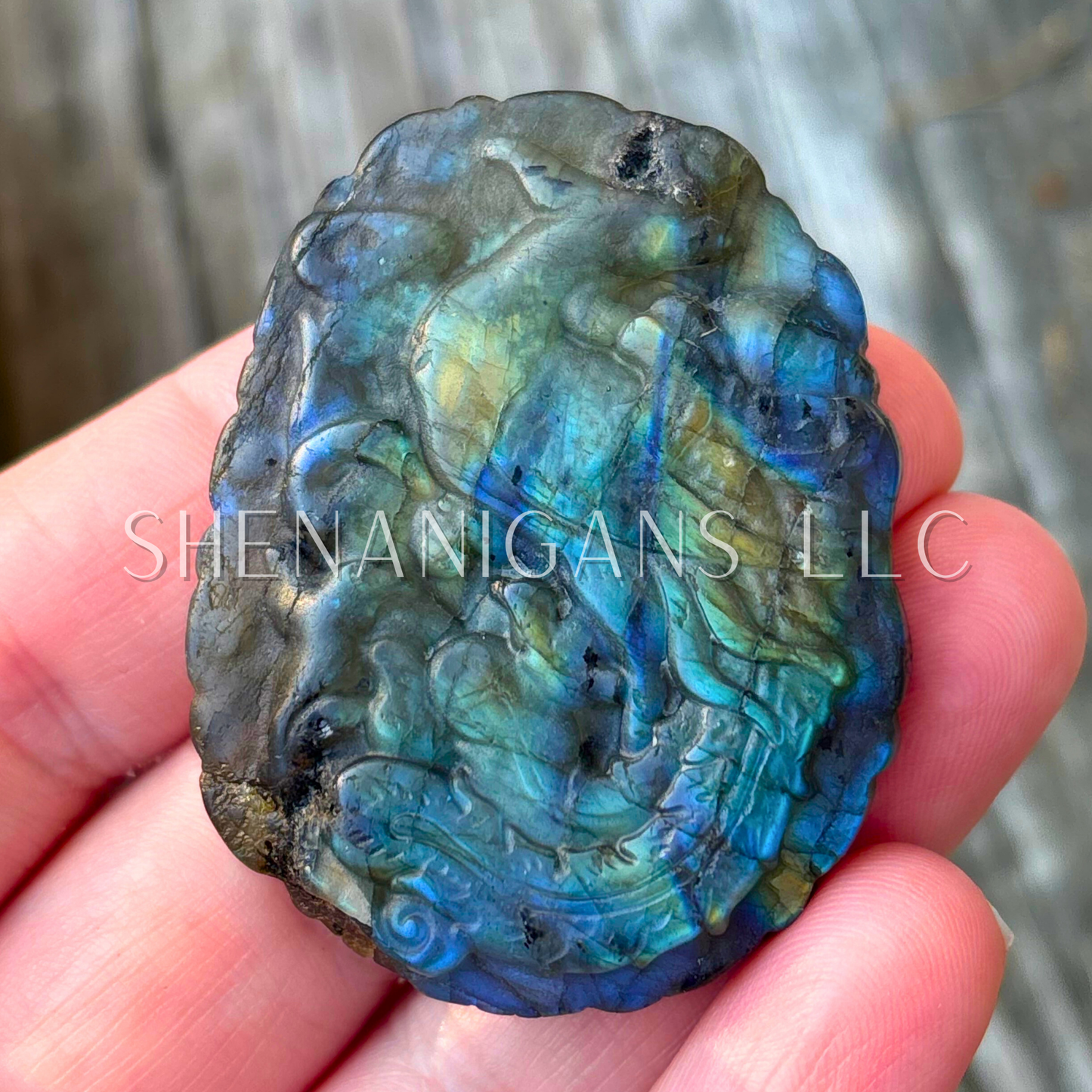Flat carving labradorite phoenix