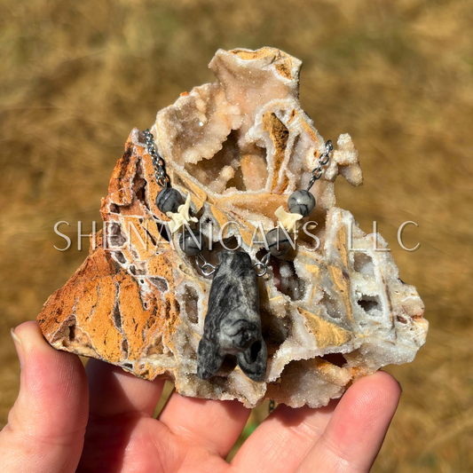 Spiderweb Jasper Hanging Fruit Bat Necklace with Rattlesnake Vertebrae