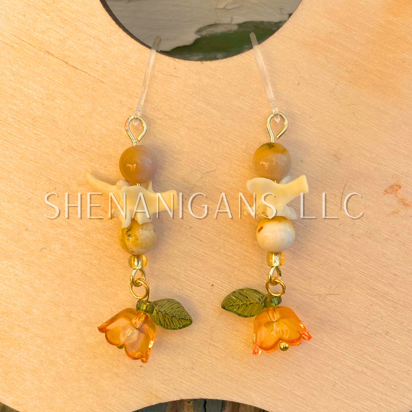 Orange and Gold Bell Flower Dangle Earrings with Snake Vertebrae and Crystal Beads
