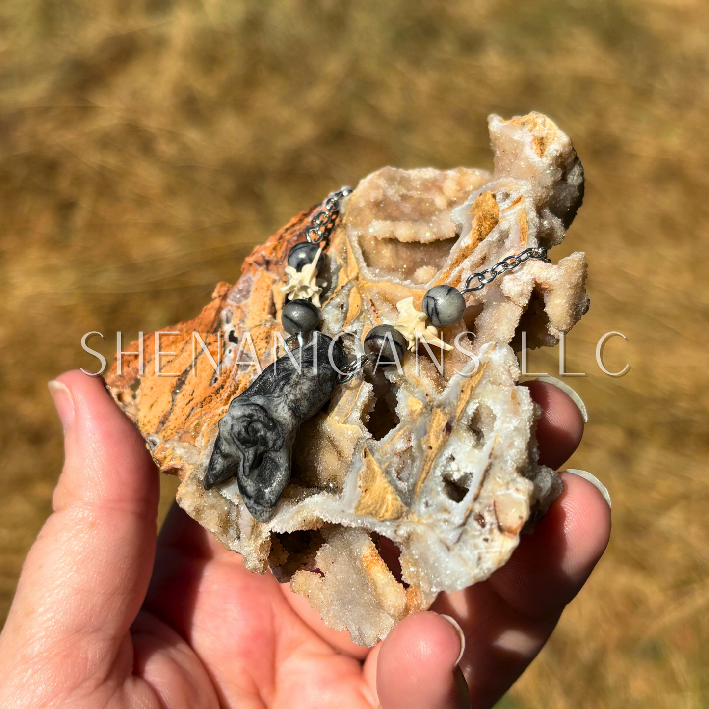 Spiderweb Jasper Hanging Fruit Bat Necklace with Rattlesnake Vertebrae