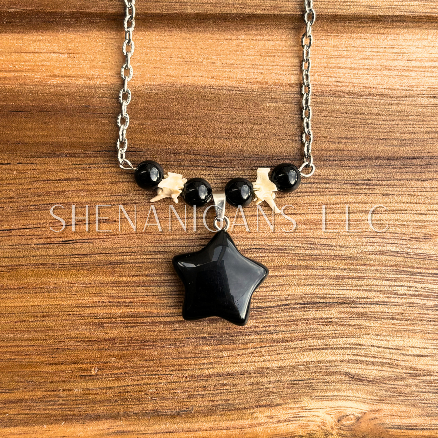 Obsidian Star Necklace – Crystal Carving with Rattlesnake Vertebrea