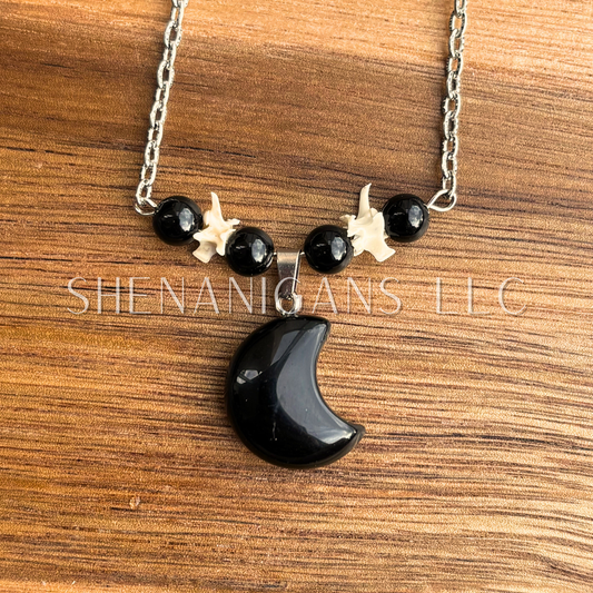 Obsidian Moon Necklace – Crystal Carving with Rattlesnake Vertebrea