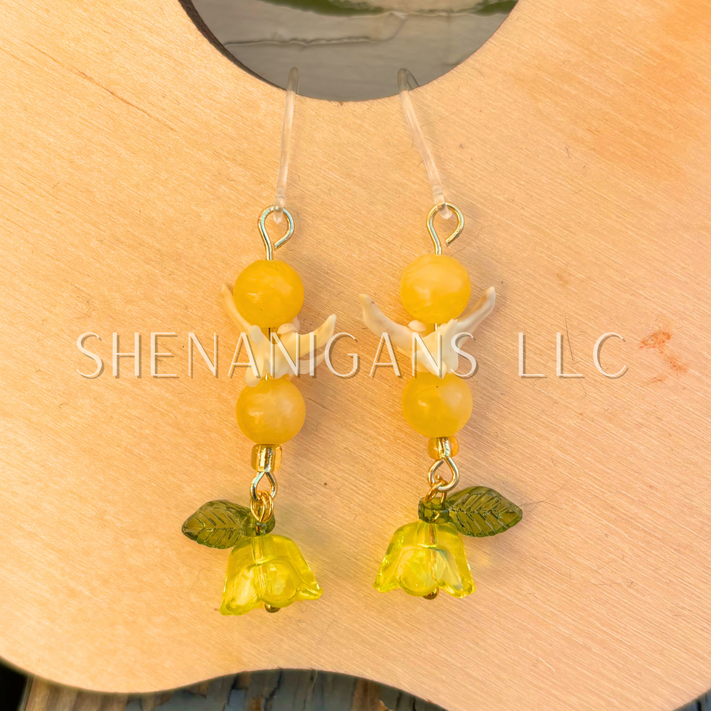 Yellow and Gold Bell Flower Dangle Earrings with Snake Vertebrae and Crystal Beads