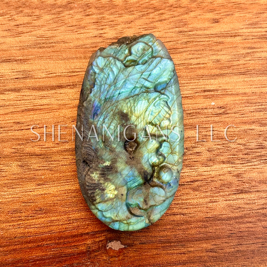 Flat carving labradorite phoenix