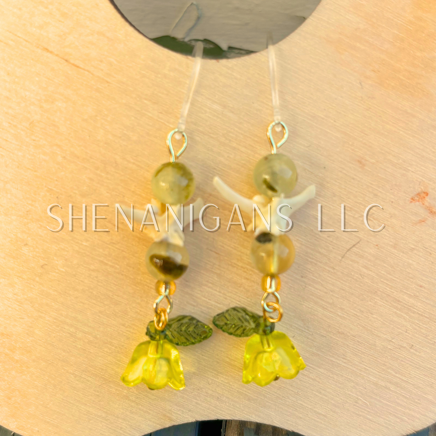 Yellow and Gold Bell Flower Dangle Earrings with Snake Vertebrae and Crystal Beads