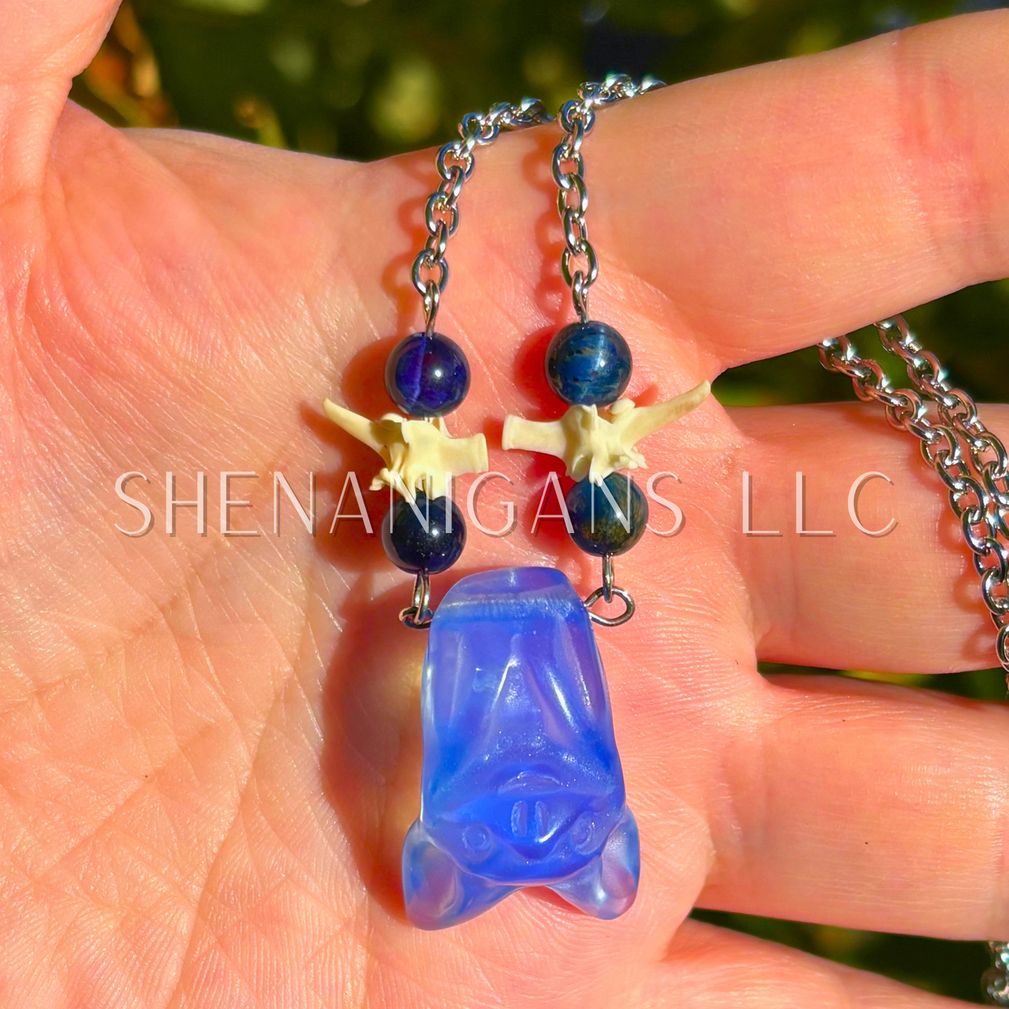 Fruit Bat Necklace – Blue Opalite Bat with Lapiz Beads and Snake Vertebrae