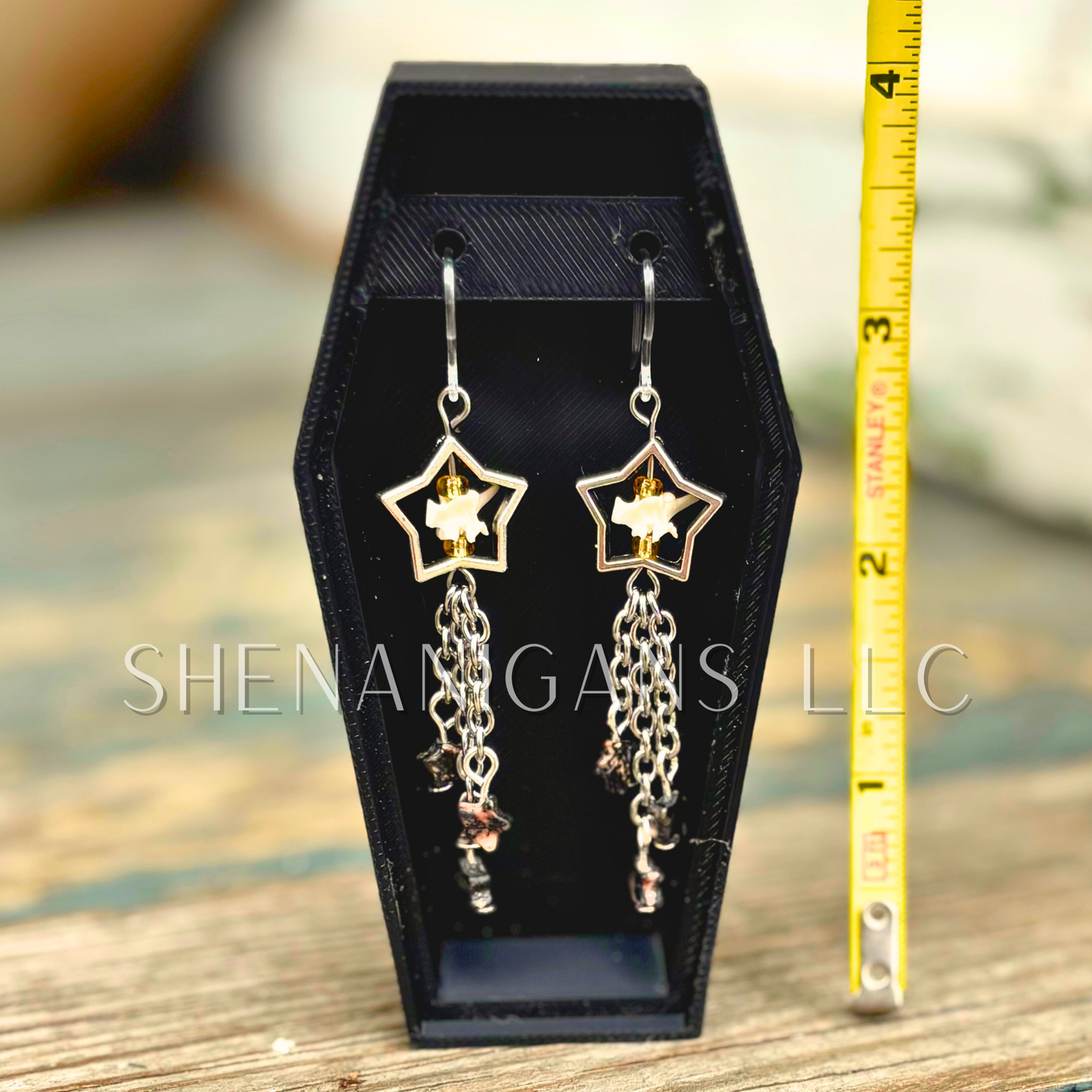 Shooting Star Earrings with Rhodonite Stars & Rattlesnake Vertebrae – Handmade Celestial Coffin Display