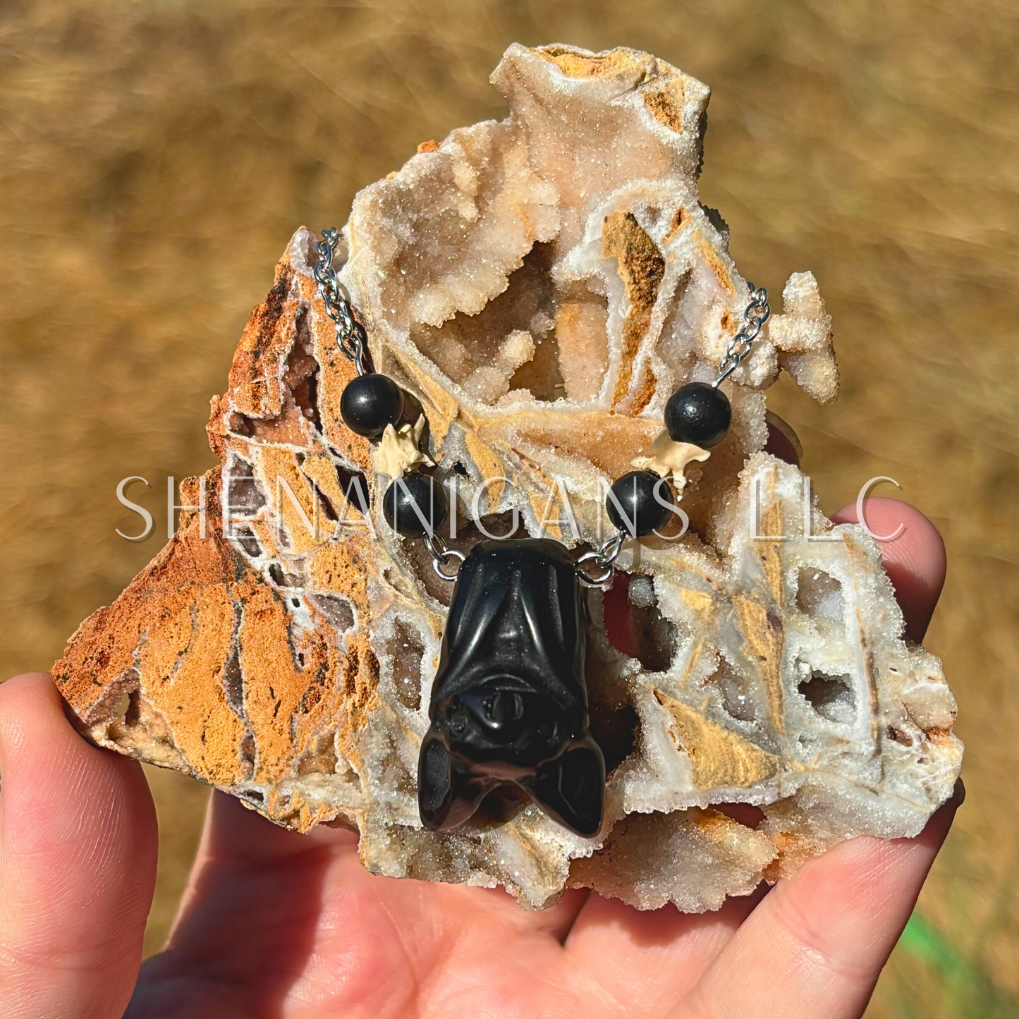 Obsidian Hanging Fruit Bat Necklace with Rattlesnake Vertebrae