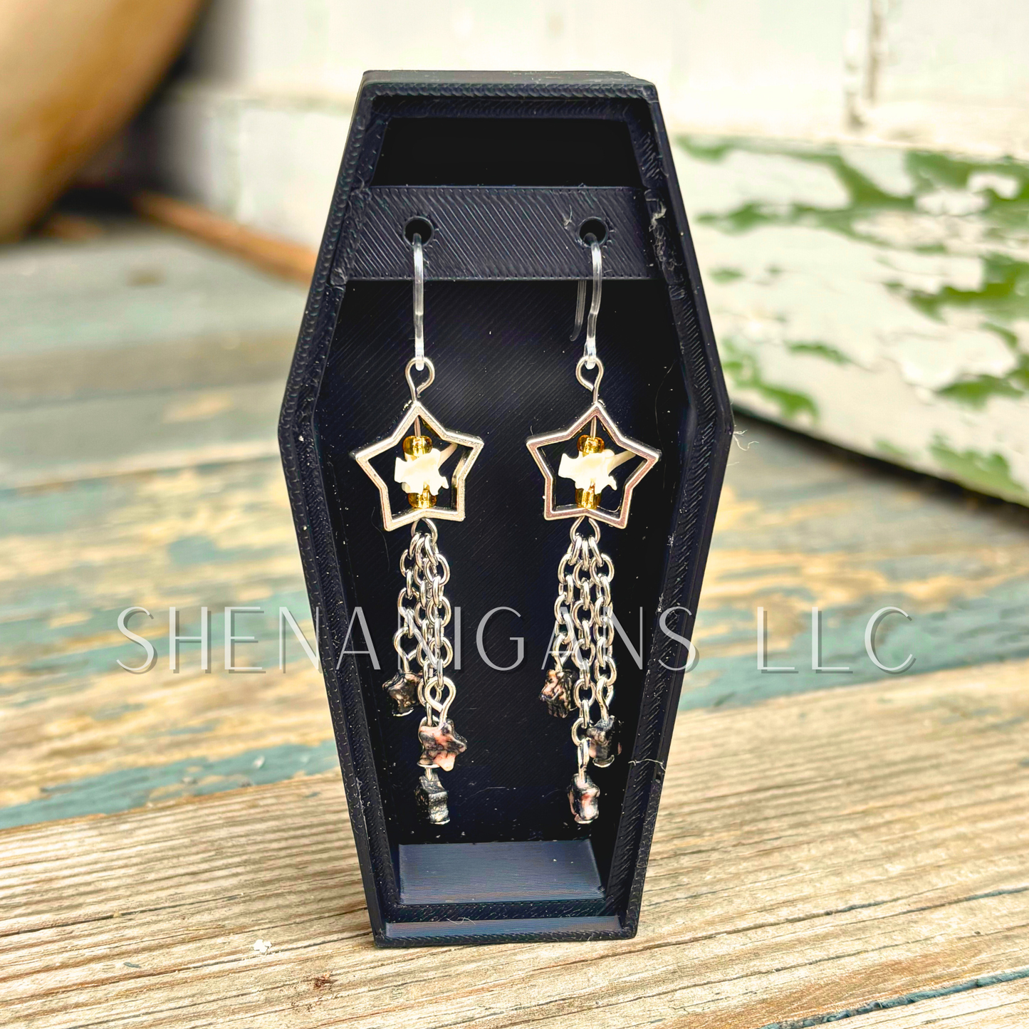 Shooting Star Earrings with Rhodonite Stars & Rattlesnake Vertebrae – Handmade Celestial Coffin Display