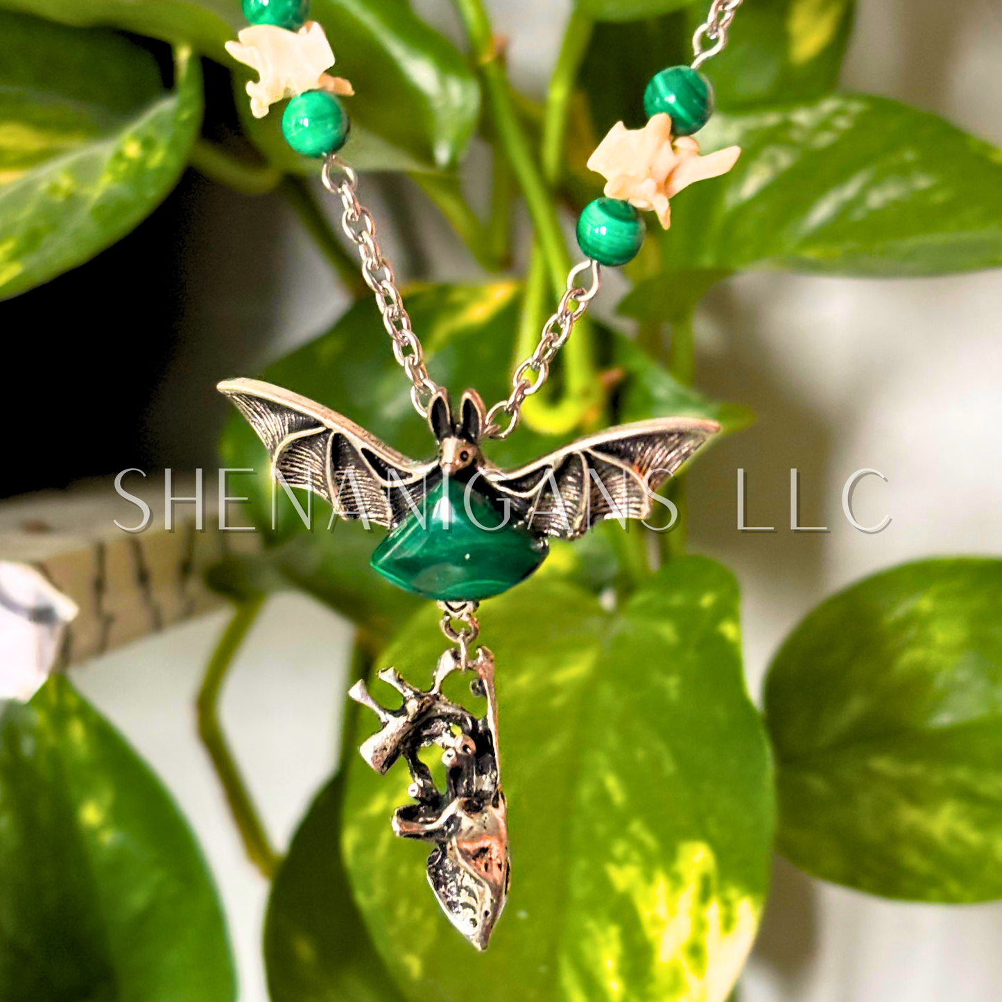Malachite Flying Bat with Anatomical Heart Necklace with Snake Vertebrae