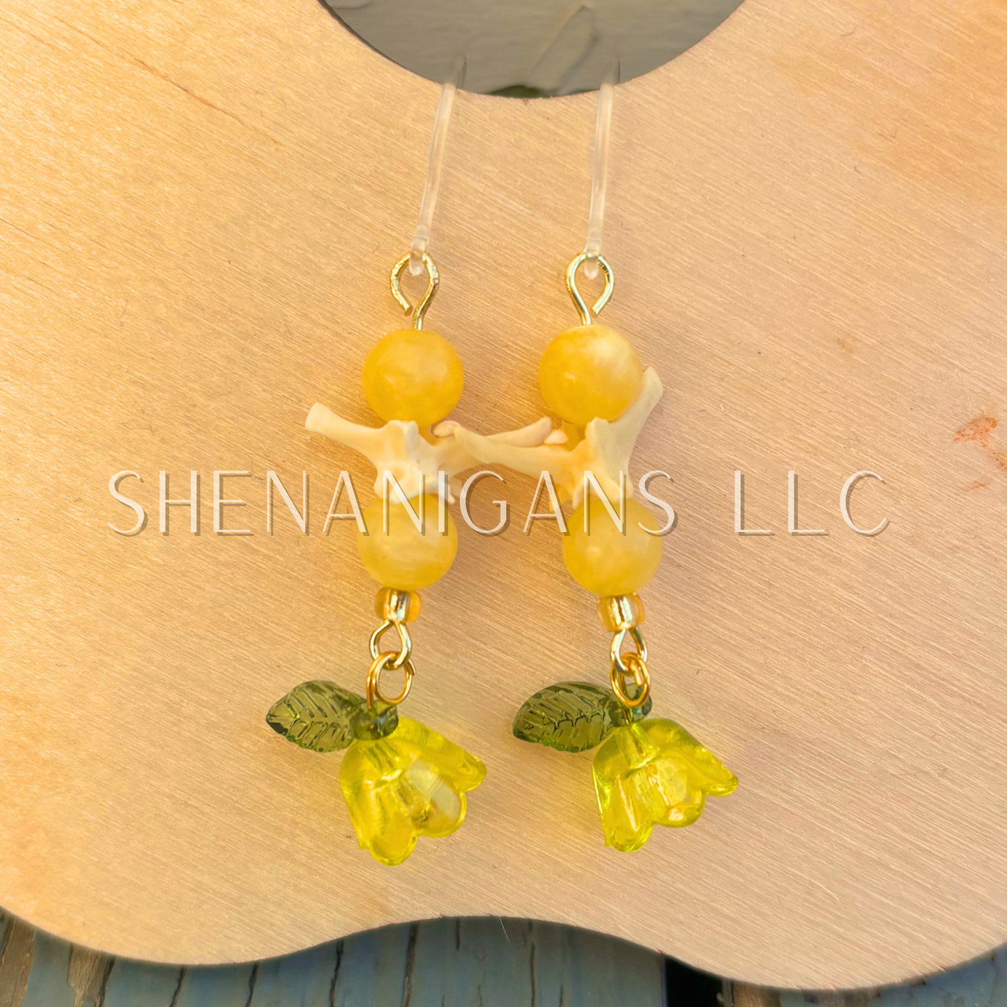 Yellow and Gold Bell Flower Dangle Earrings with Snake Vertebrae and Crystal Beads