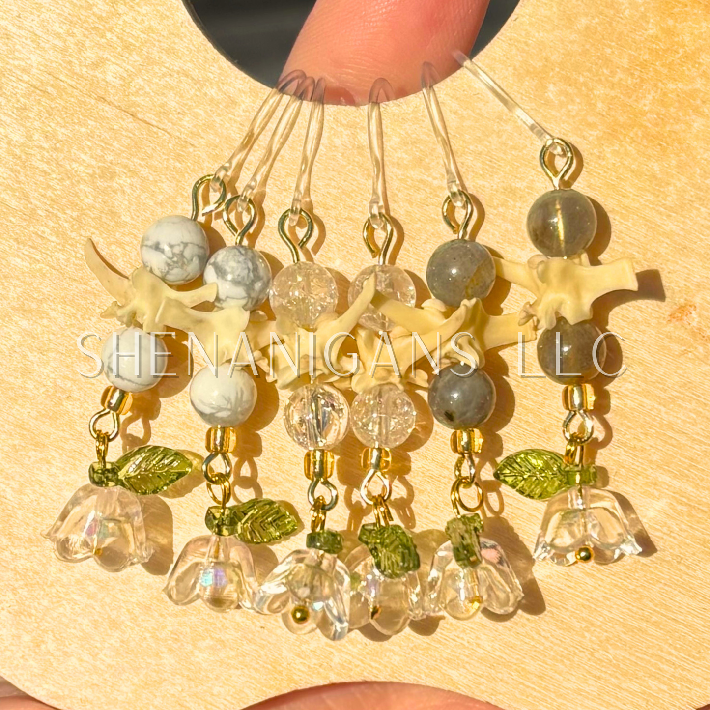 White and Gold Bell Flower Dangle Earrings with Snake Vertebrae and Crystal Beads