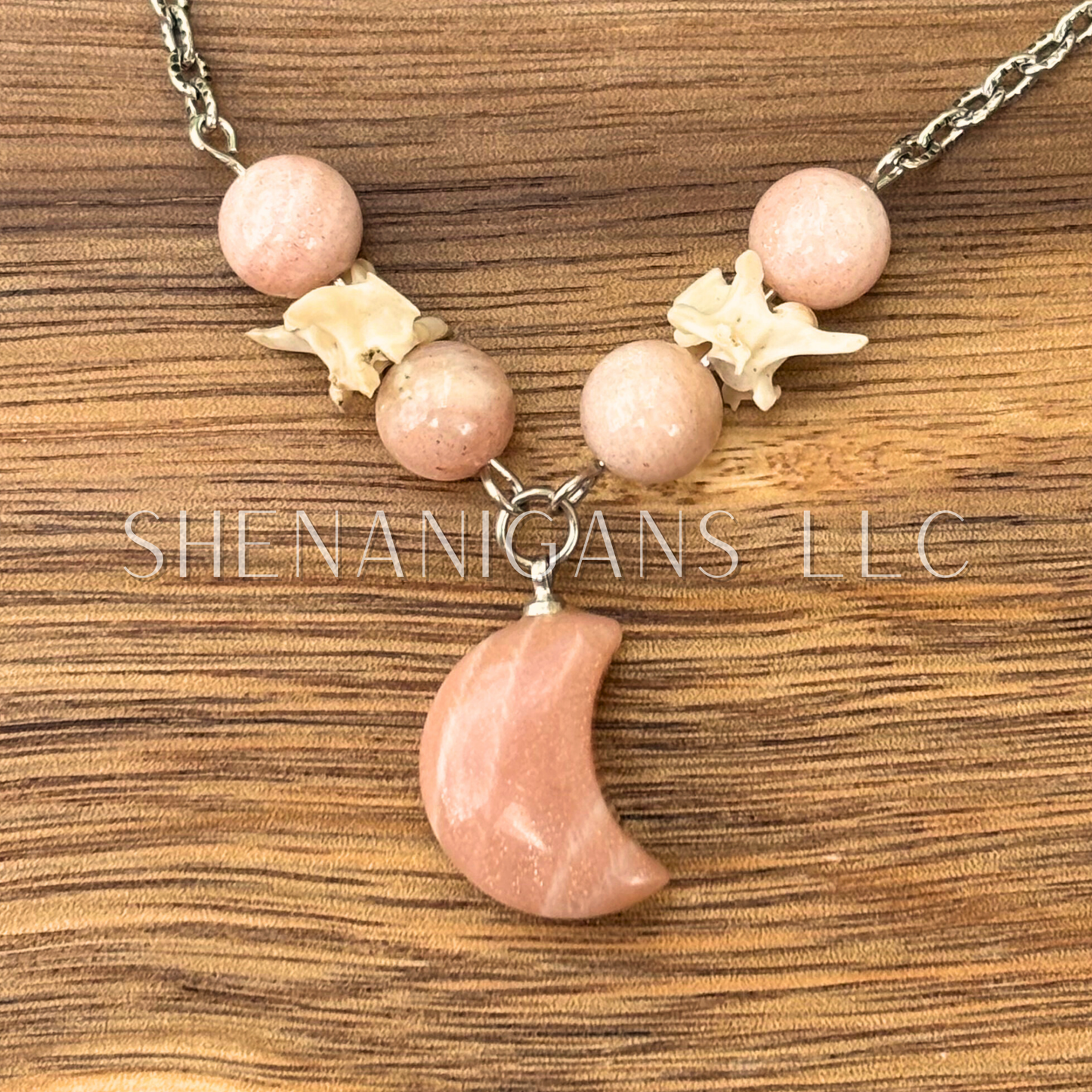 Sunstone Moon Necklace – Crystal Carving with Beads & Bone Detail