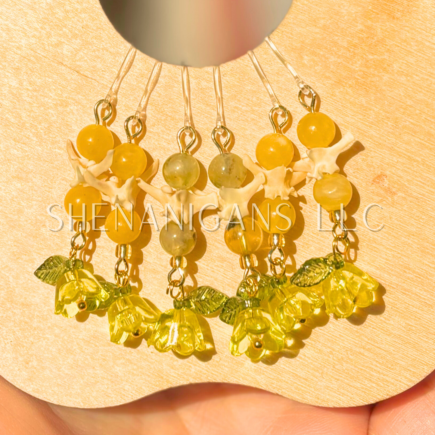 Yellow and Gold Bell Flower Dangle Earrings with Snake Vertebrae and Crystal Beads