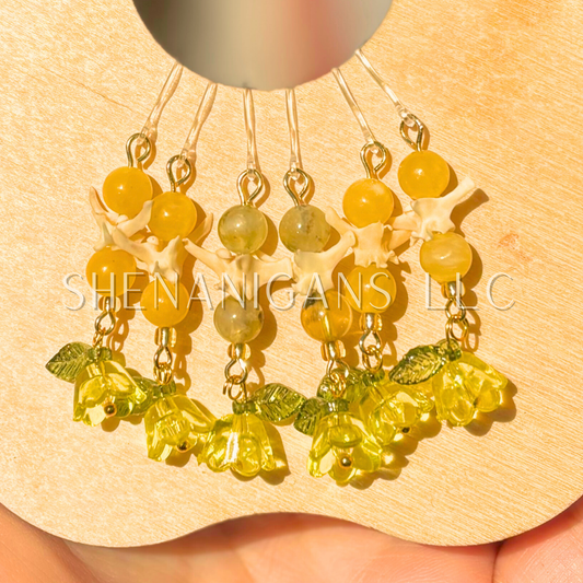 Yellow and Gold Bell Flower Dangle Earrings with Snake Vertebrae and Crystal Beads