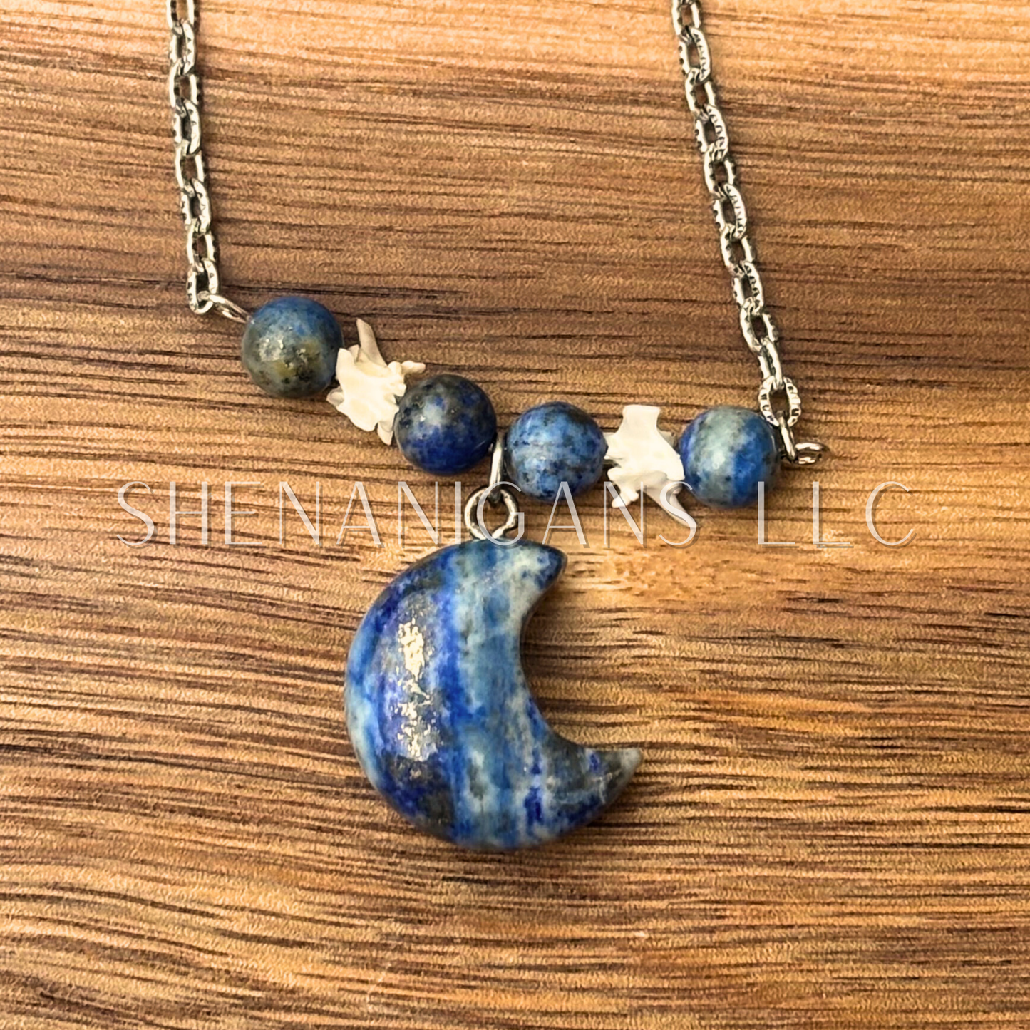 Lapis Lazuli Moon Necklace – Crystal Carving with Beads & Bone Detail