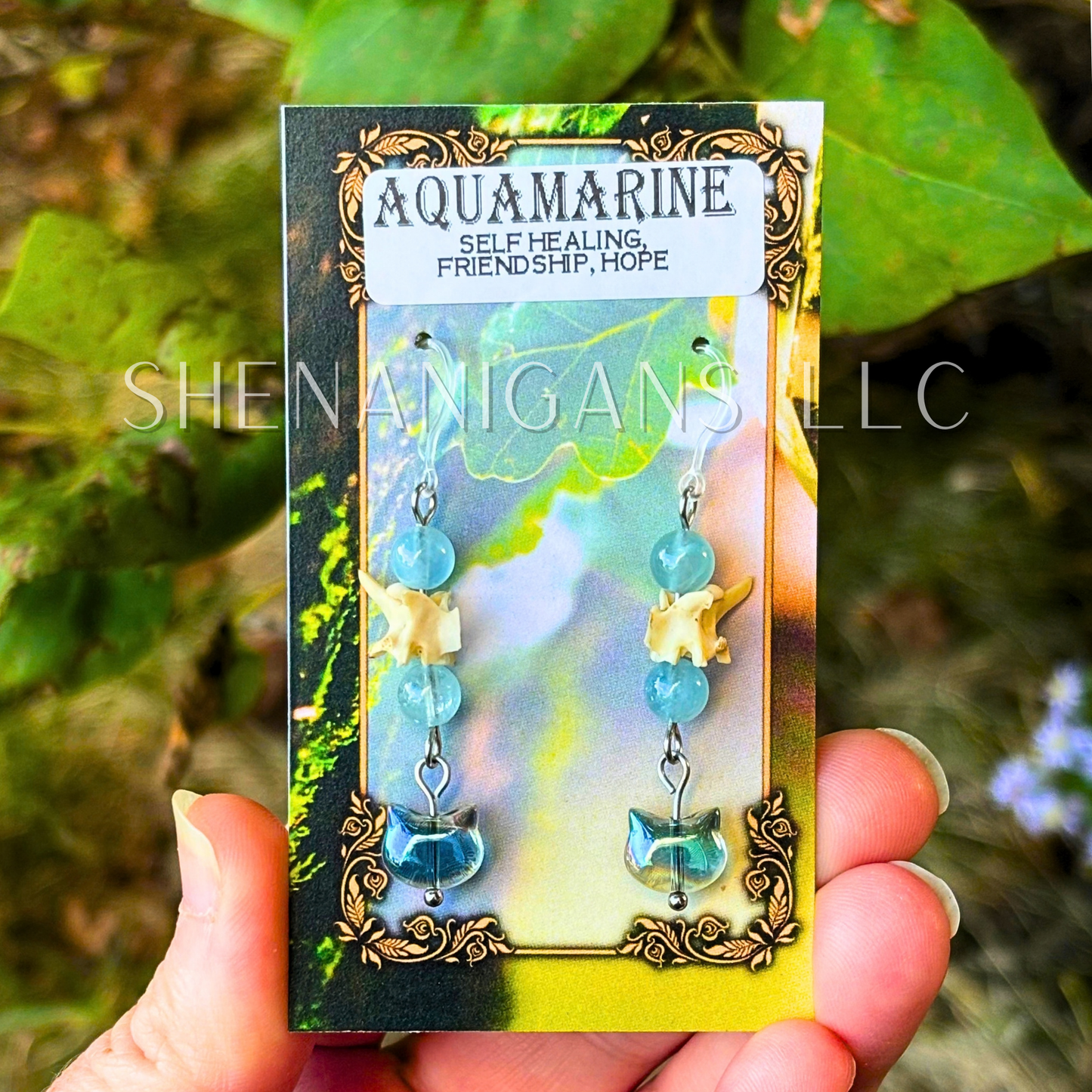Aura Cat Head Earrings with Silver Tones, Snake Vertebrae, and Crystal Beads