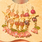 Pink and Gold Bell Flower Dangle Earrings with Snake Vertebrae and Crystal Beads