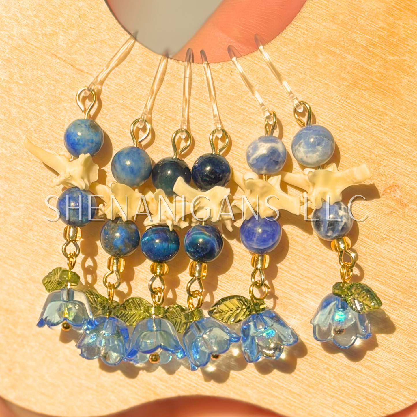 Blue and Gold Bell Flower Dangle Earrings with Snake Vertebrae and Crystal Beads