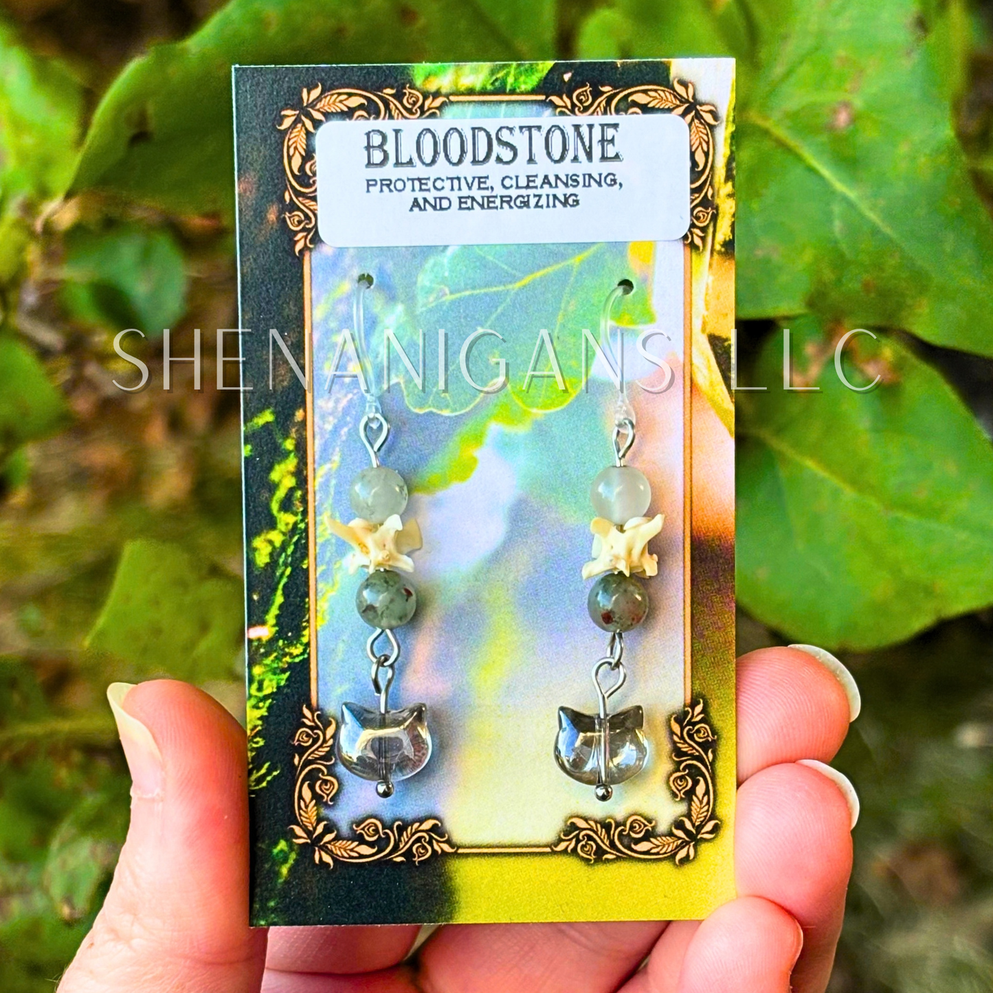Aura Cat Head Earrings with Silver Tones, Snake Vertebrae, and Crystal Beads