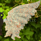 Yooperlite Owl Wings on Stand Crystal Carving UV Reactive