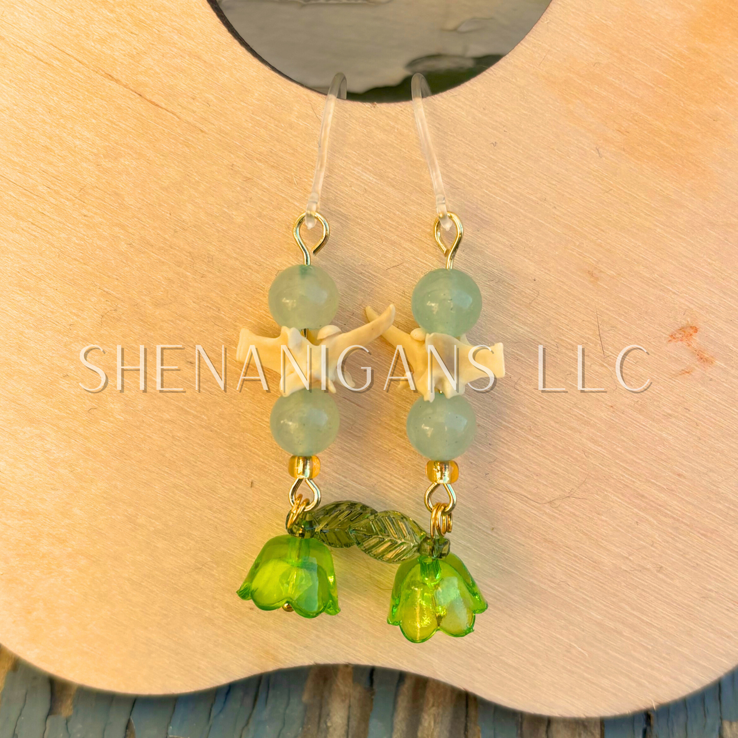 Green and Gold Bell Flower Dangle Earrings with Snake Vertebrae and Crystal Beads