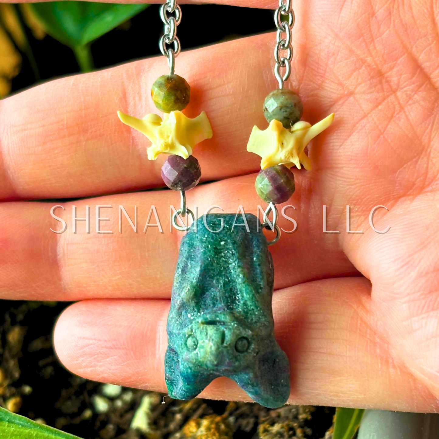 UV Reactive Ruby Kynite Bat Necklace – Crystal Carving with Snake Vertebrae and Ruby Kyanite Beads